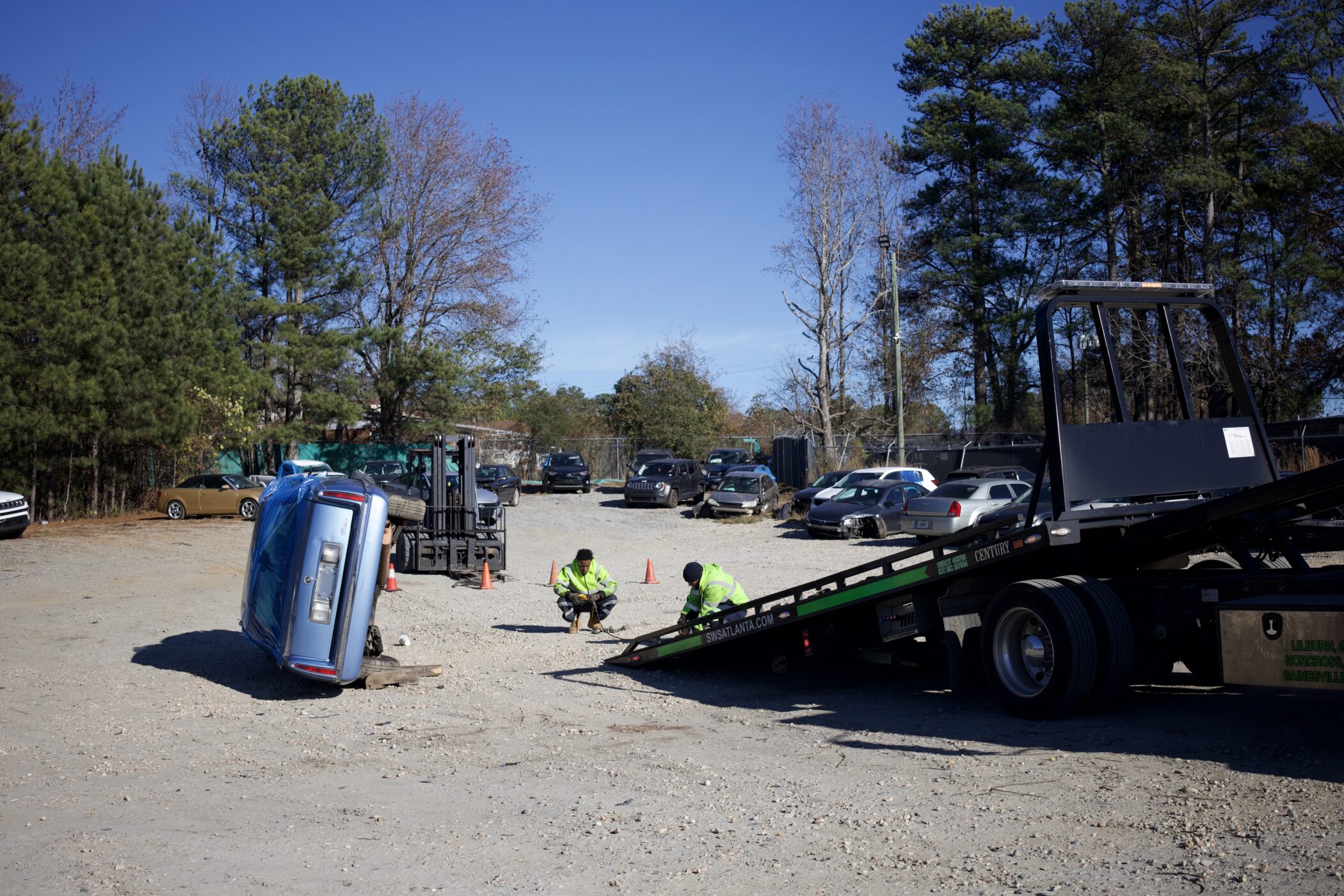 24/7 Professional Vehicle Recovery Services In Gwinnett County 3 SWS Flat Bed Truck on | Statewide Wrecker